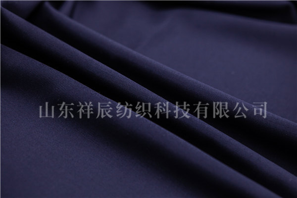 藏青毛涤贡丝锦50W/50P 90s/2*2，330g/m